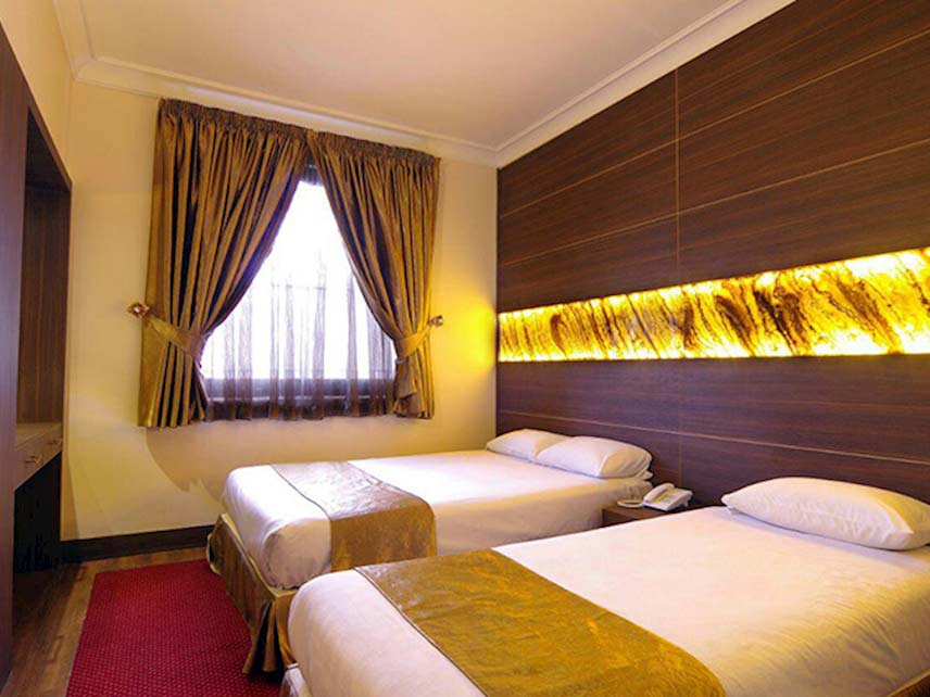 اتاق سه تخته هتل آپارتمان مهر مشهد